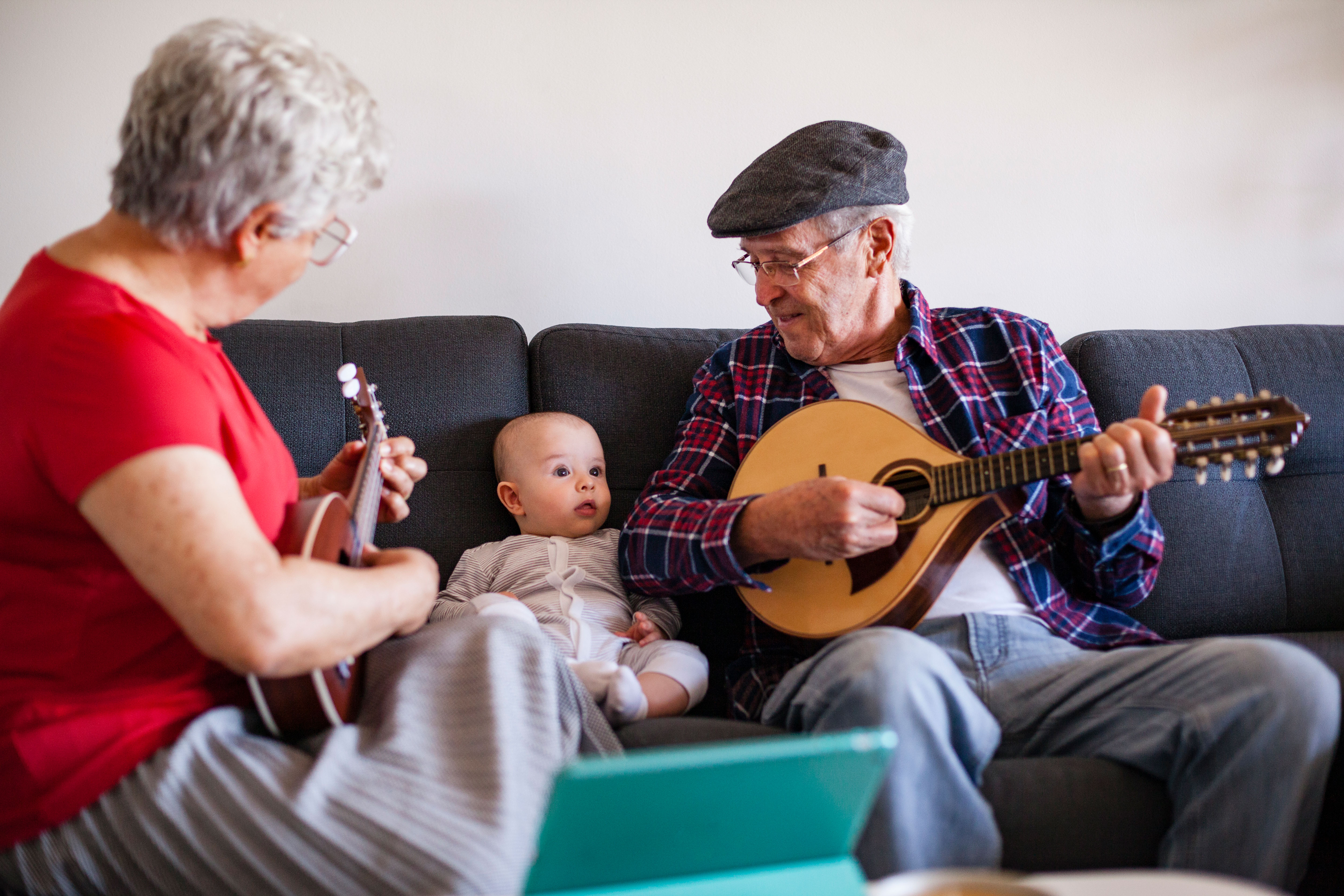 A family sharing music with a baby