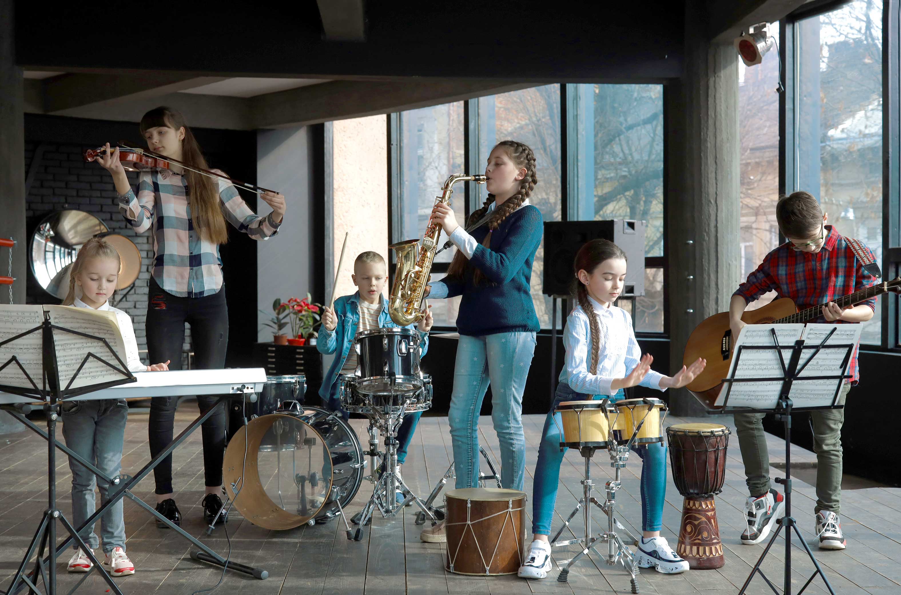 Children making music together